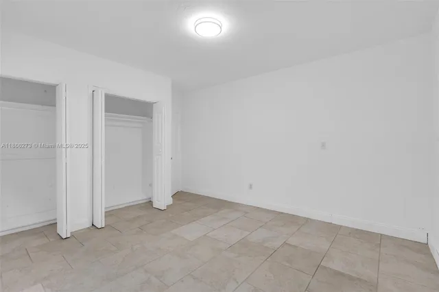 an empty room with an entryway