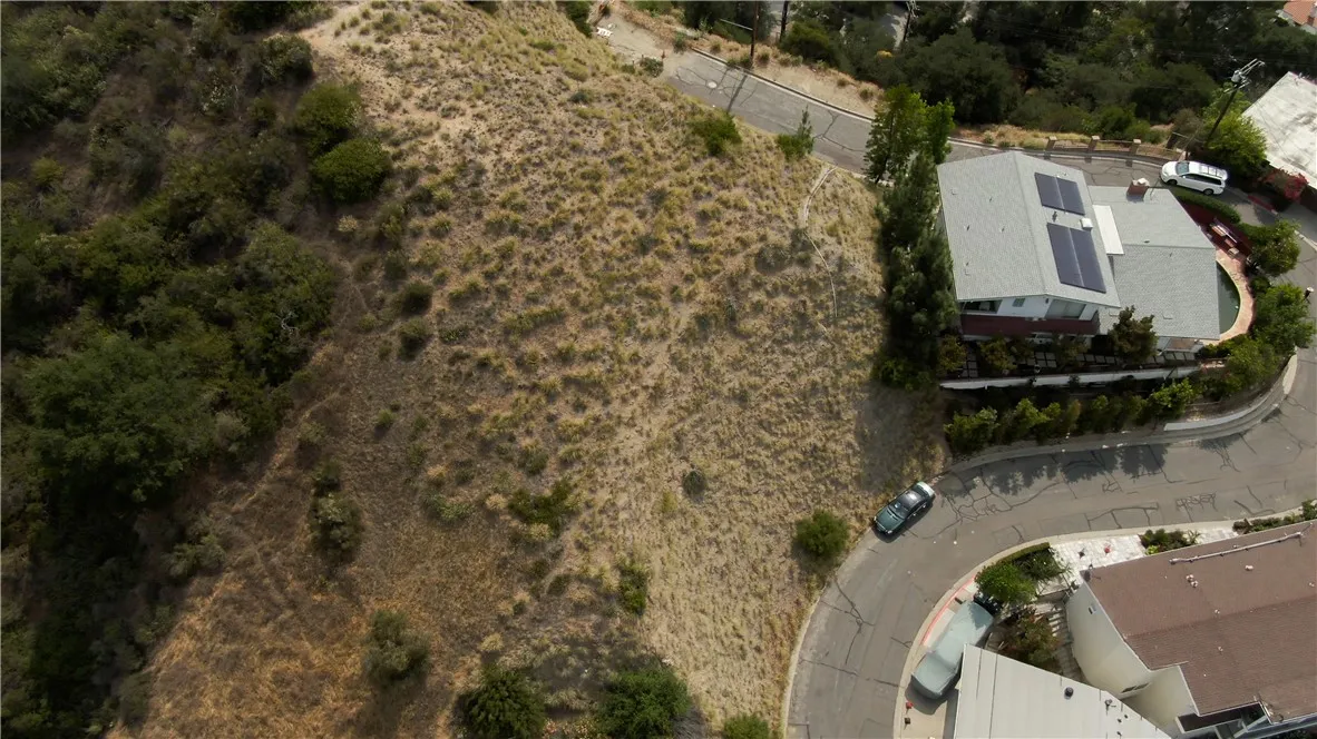 an aerial view of residential house with outdoor space