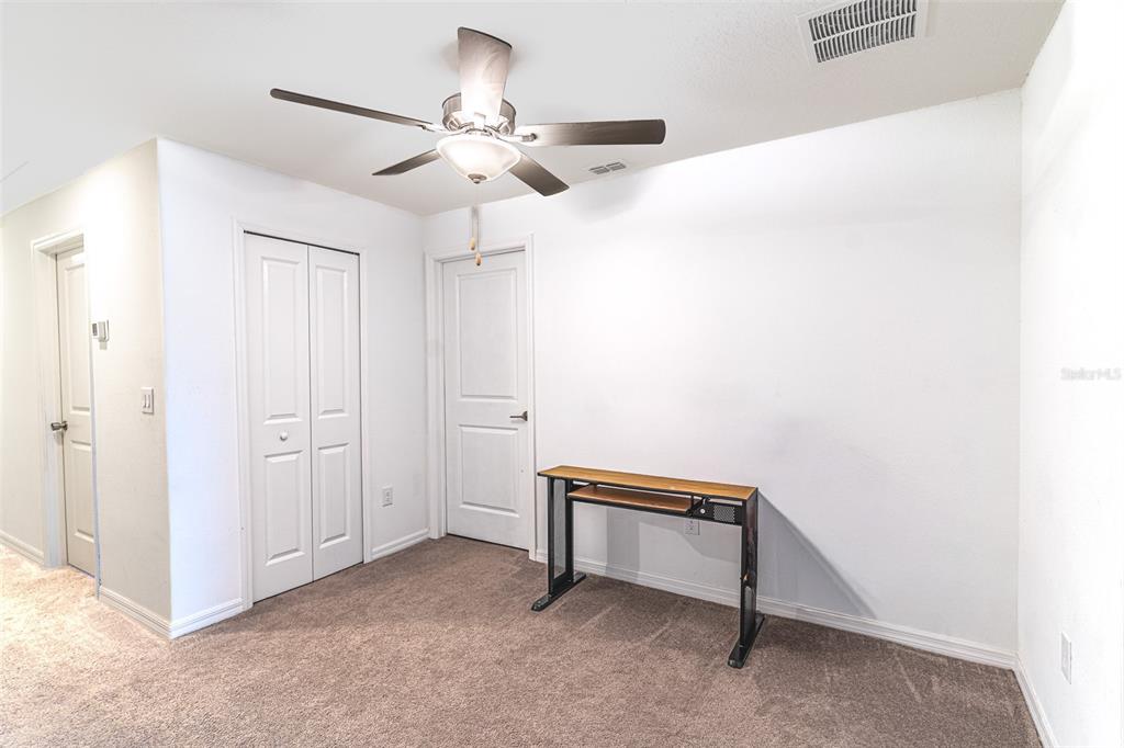 7014 Ripple Pond Loop Zephyrhills, FL 33541 - Photo 12 of 40 a view of an empty room