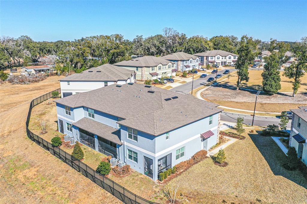 7014 Ripple Pond Loop Zephyrhills, FL 33541 - Photo 18 of 40 a view of a house with a swimming pool