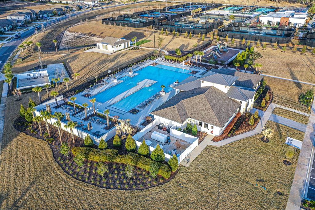 7014 Ripple Pond Loop Zephyrhills, FL 33541 - Photo 26 of 40 an aerial view of a house with a ocean view