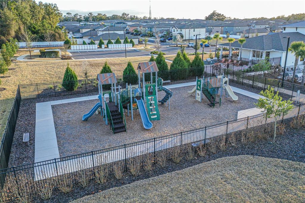 7014 Ripple Pond Loop Zephyrhills, FL 33541 - Photo 28 of 40 an aerial view of multiple house