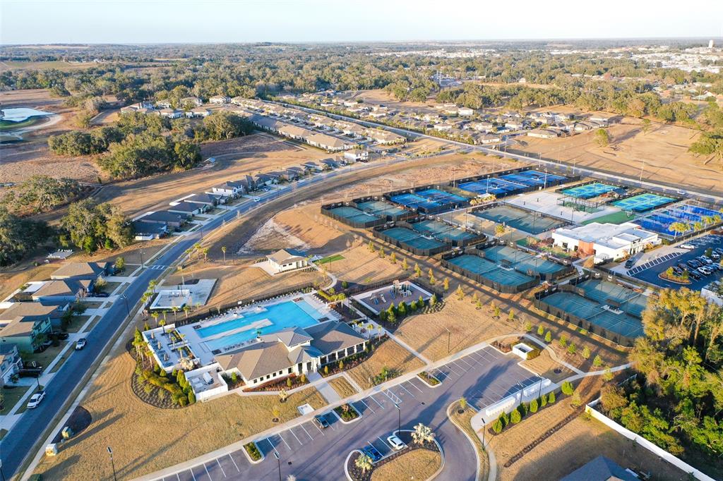 7014 Ripple Pond Loop Zephyrhills, FL 33541 - Photo 31 of 40 an aerial view of residential building and lake view