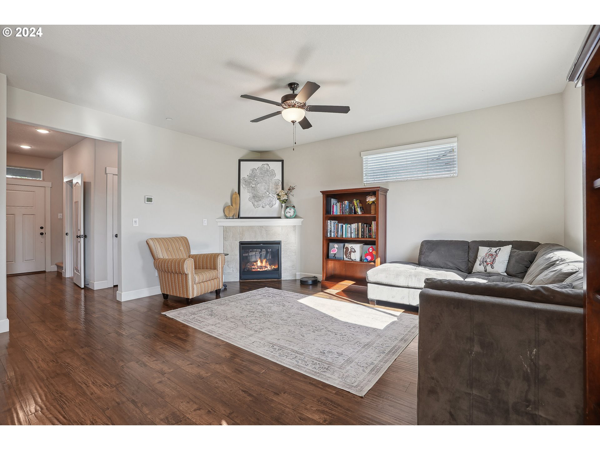 3520 Northeast Spruce Drive Camas, WA 98607 - Photo 11 of 38 a living room with furniture and a fireplace