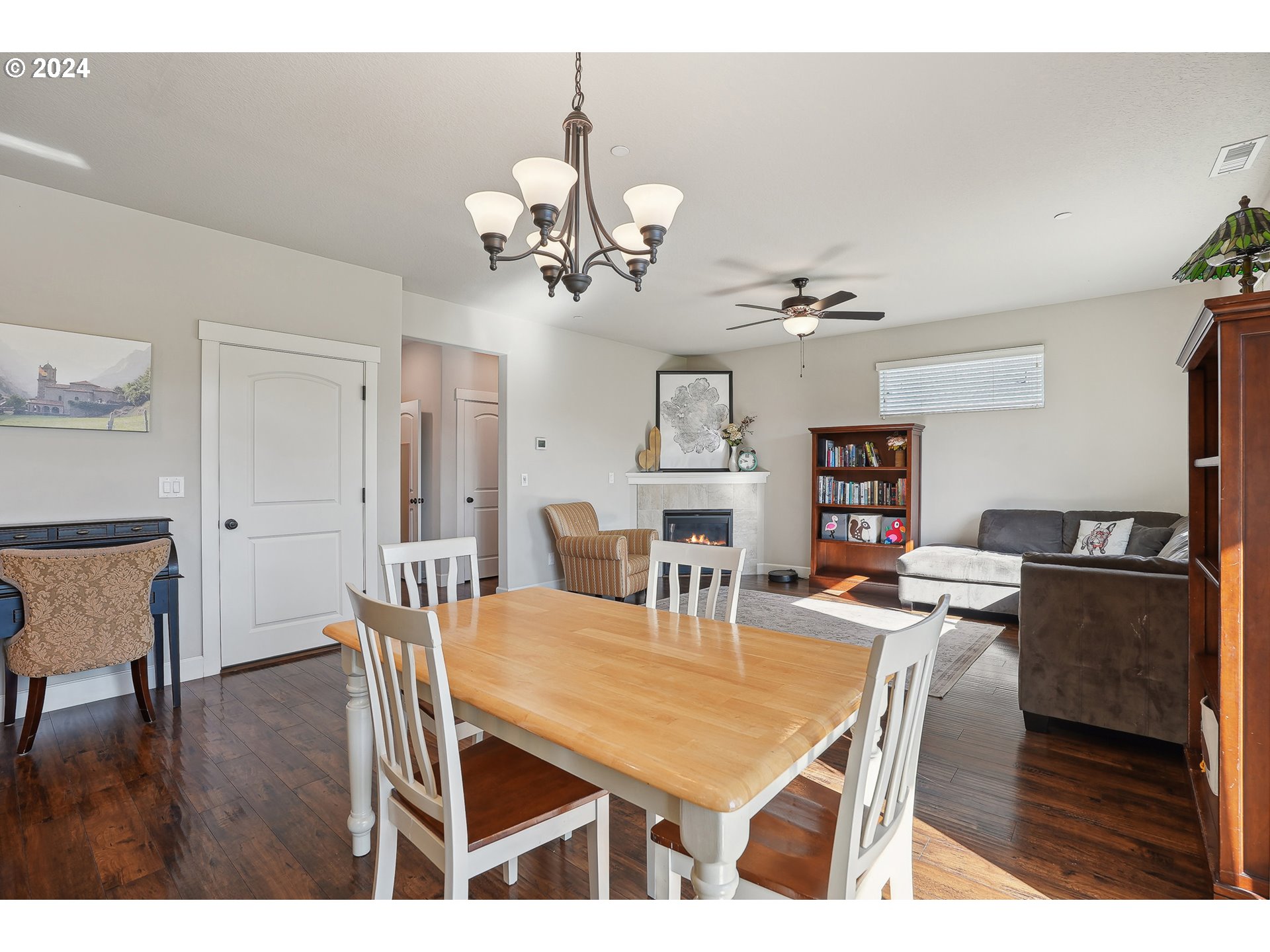 3520 Northeast Spruce Drive Camas, WA 98607 - Photo 18 of 38 a view of a dining room with furniture and wooden floor