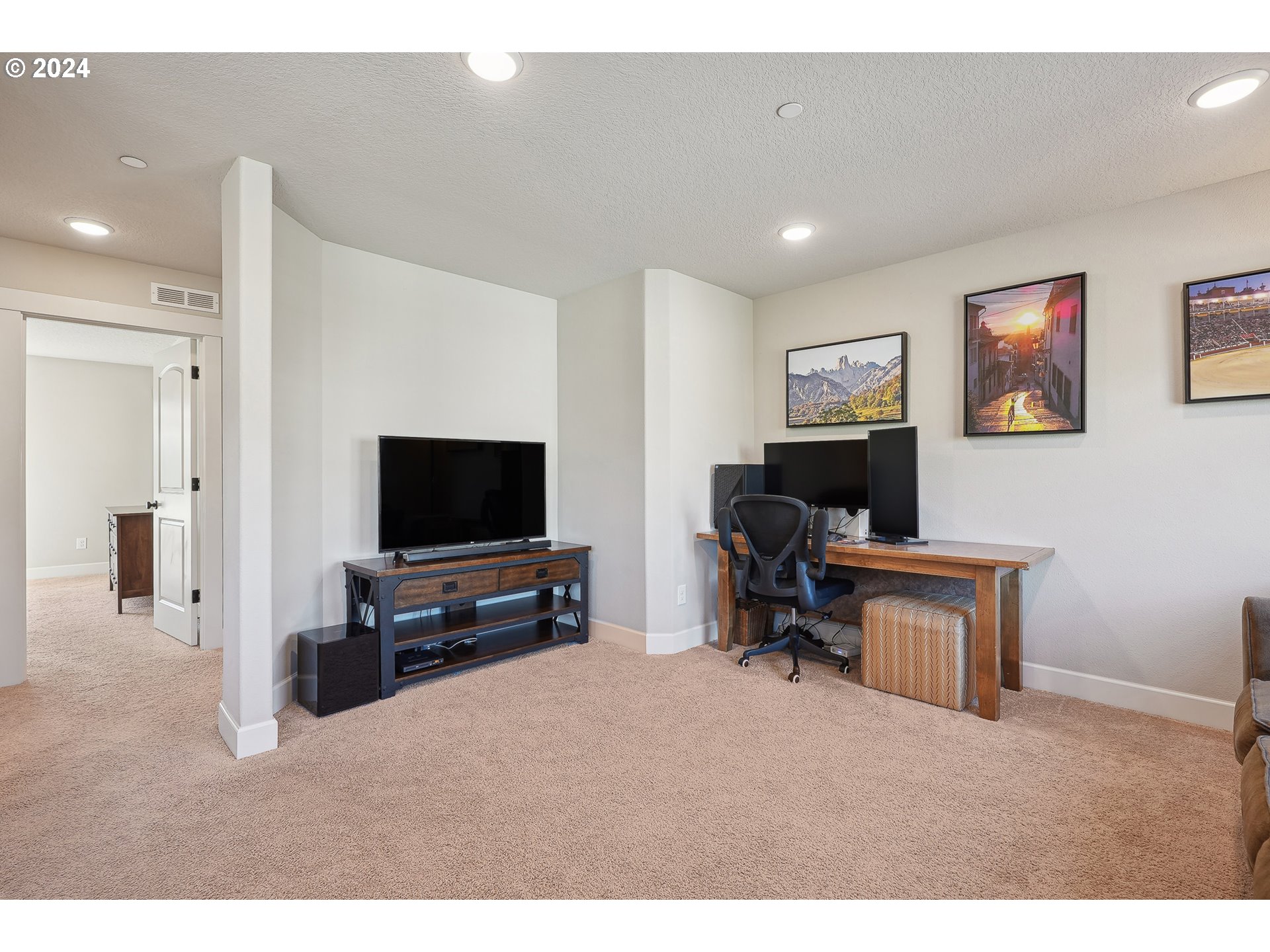 3520 Northeast Spruce Drive Camas, WA 98607 - Photo 19 of 38 a living room with furniture and a flat screen tv