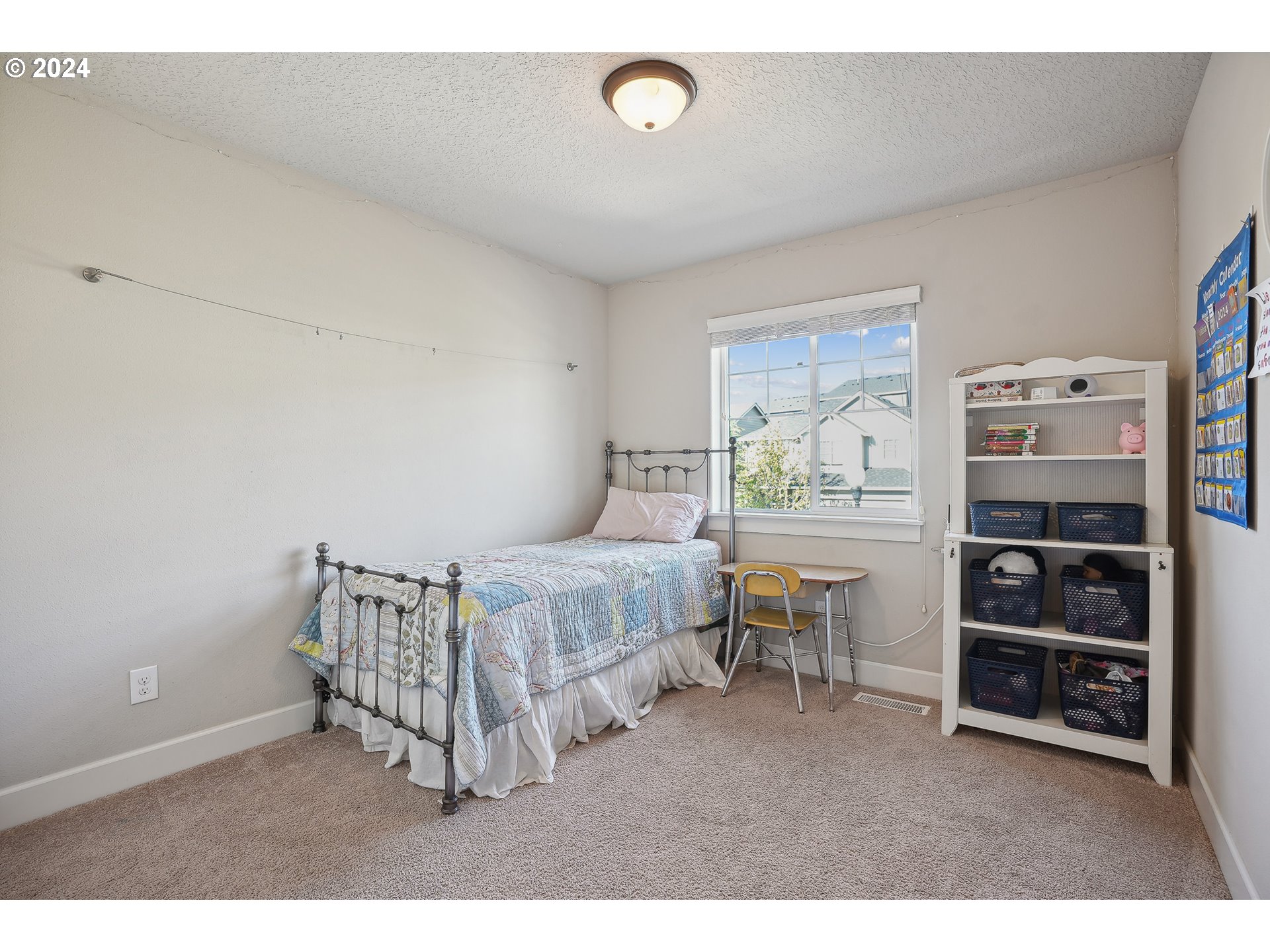 3520 Northeast Spruce Drive Camas, WA 98607 - Photo 28 of 38 a bedroom with a bed and a window