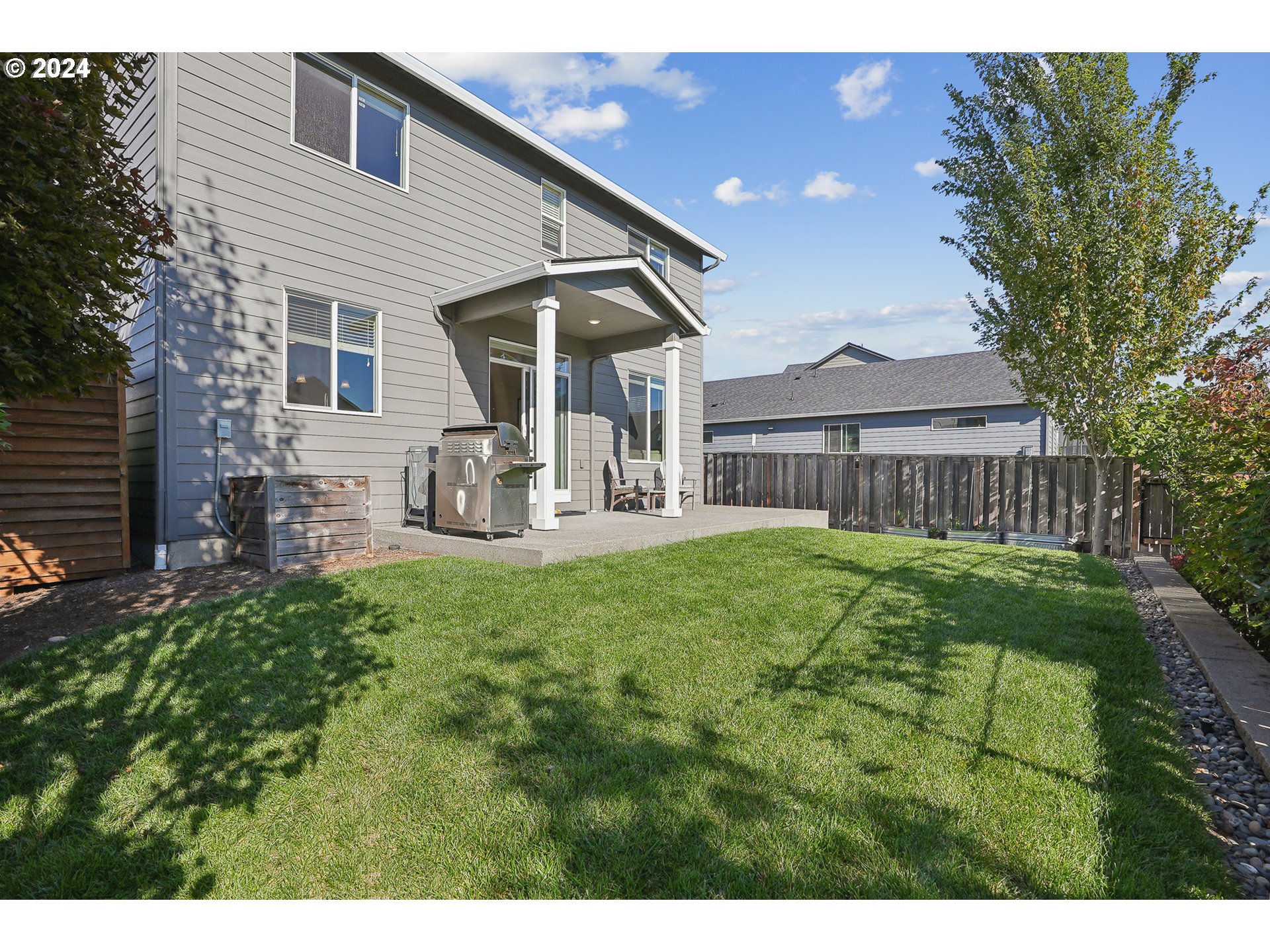 3520 Northeast Spruce Drive Camas, WA 98607 - Photo 34 of 38 a front view of a house with garden