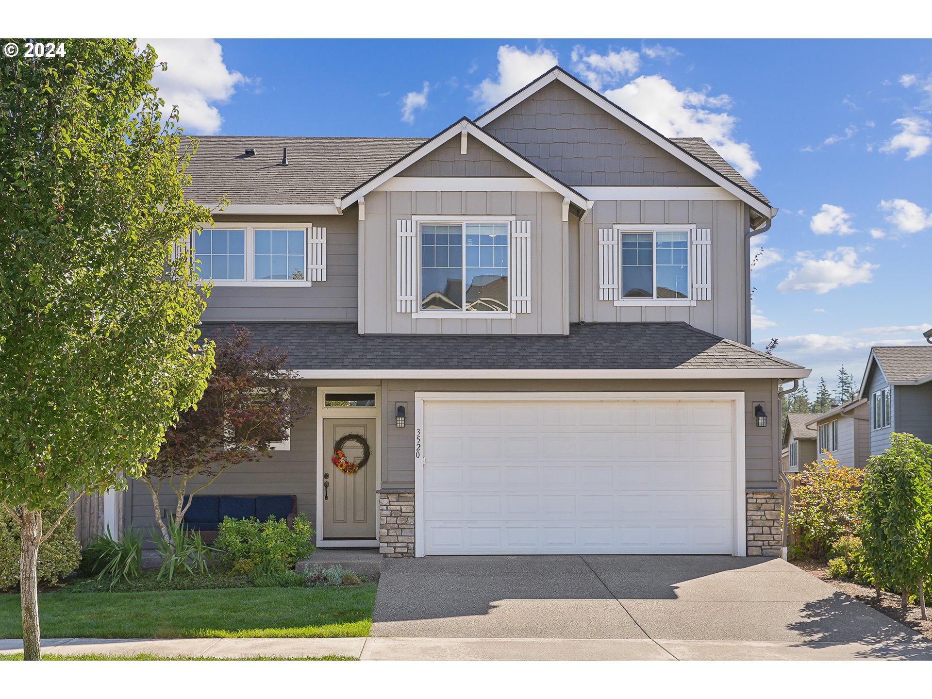 3520 Northeast Spruce Drive Camas, WA 98607 - Photo 36 of 38 a front view of a house with a garden