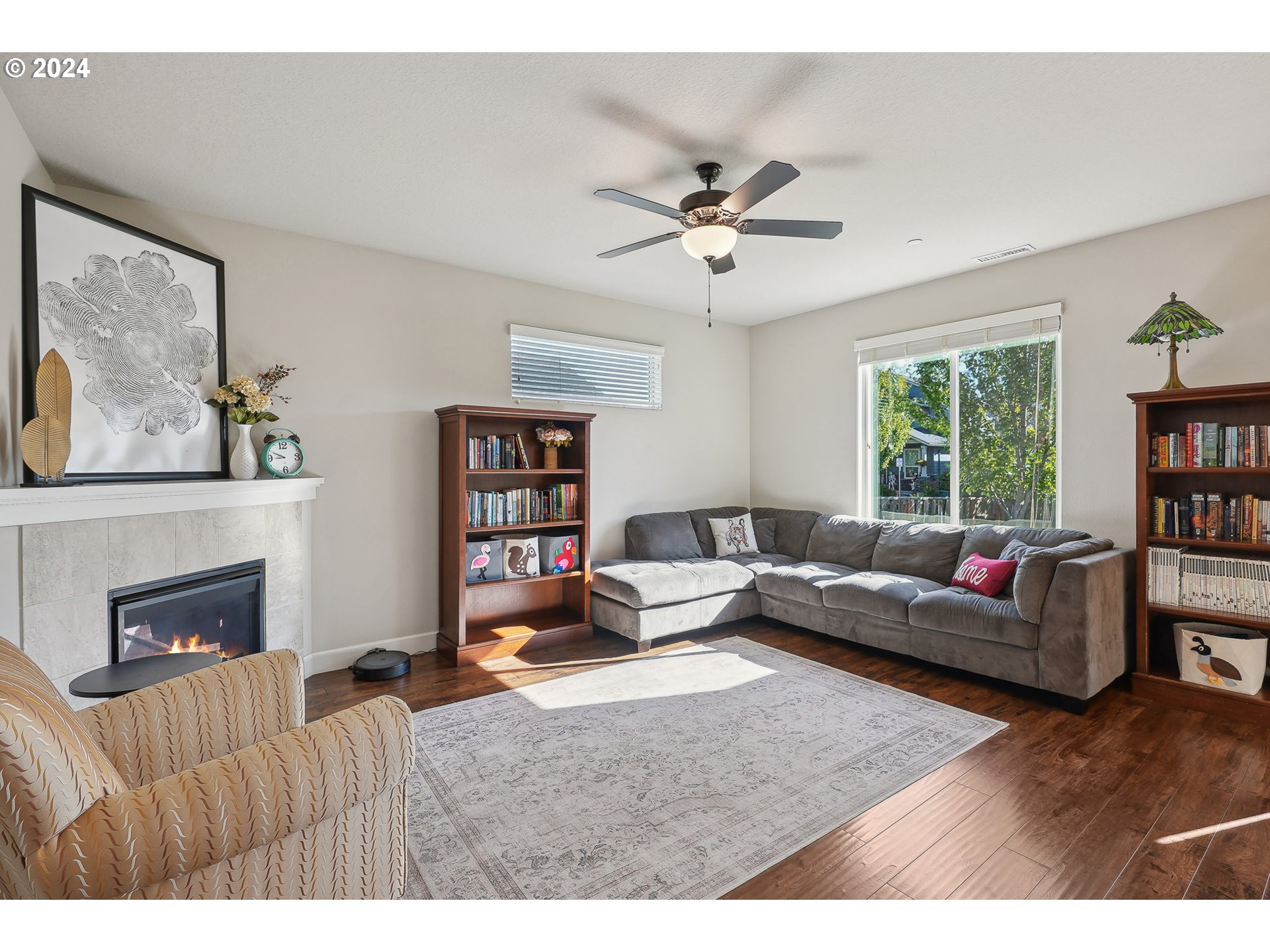 3520 Northeast Spruce Drive Camas, WA 98607 - Photo 9 of 38 a living room with furniture and a fireplace