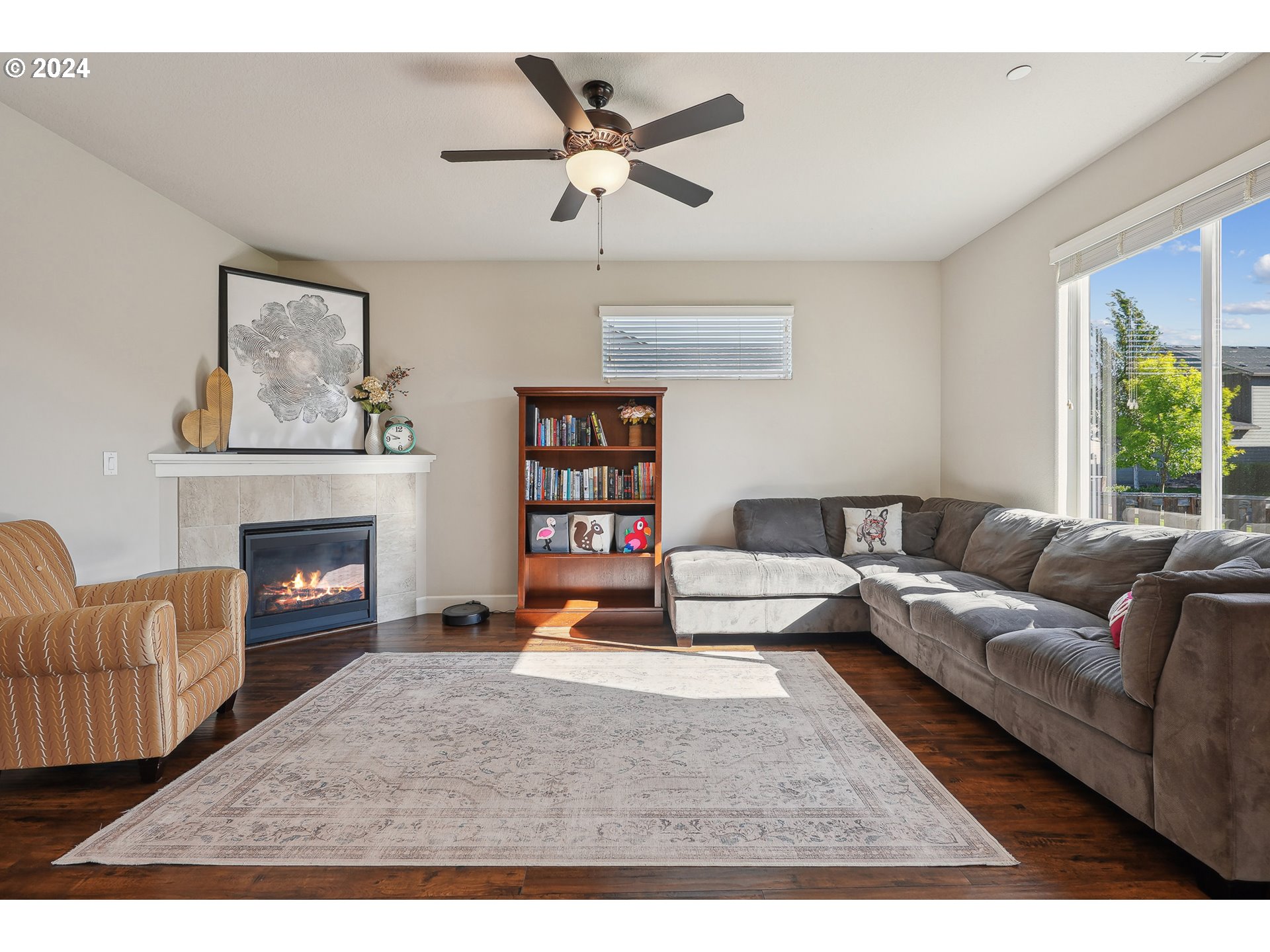 3520 Northeast Spruce Drive Camas, WA 98607 - Photo 10 of 38 a living room with furniture and a fireplace
