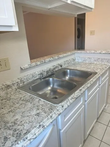 a view closed with a granite countertop sink