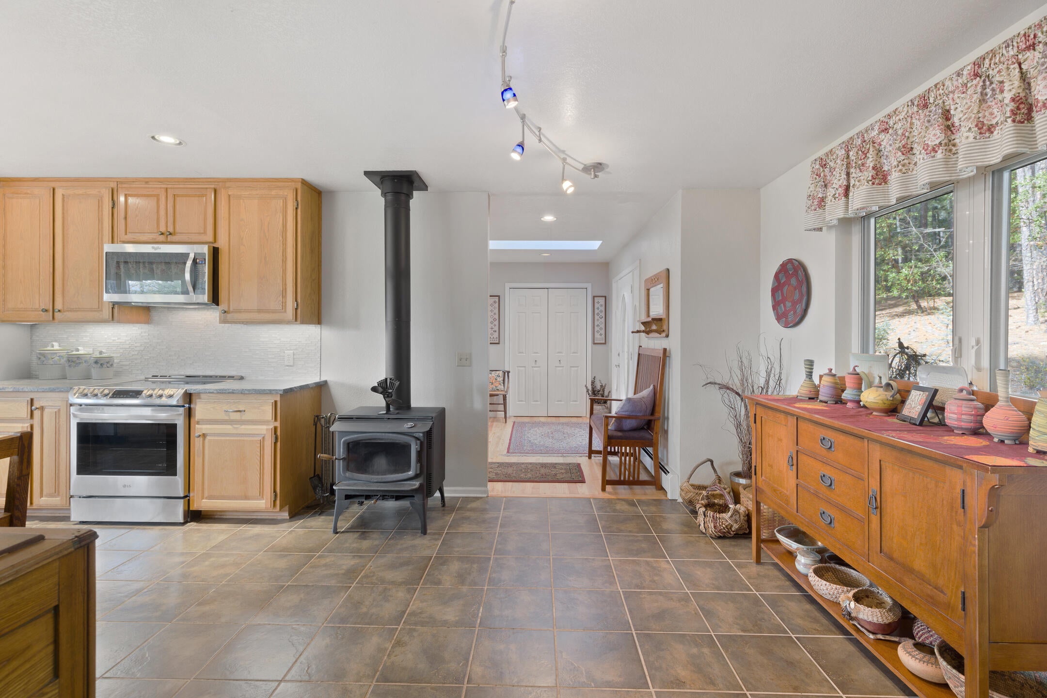 620 Eight Dollar Mountain Road Selma, OR 97538 - Photo 8 of 46 Certified Woodstove in kitchen