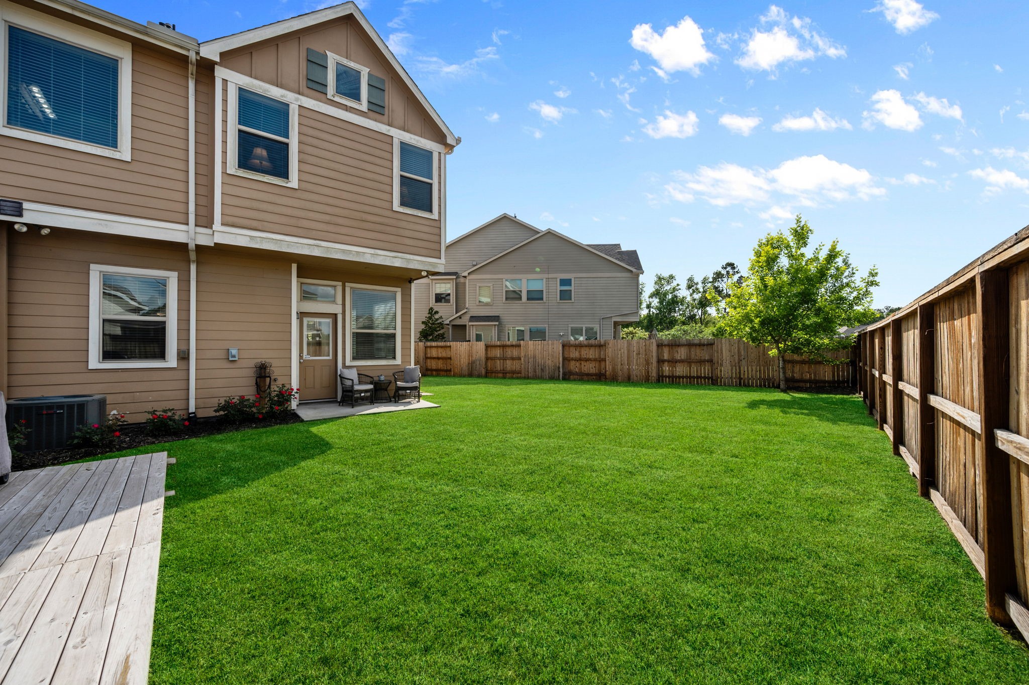 25330 Fallen Acorn Court Porter, TX 77365 - Photo 21 of 31 Large backyard has deck built for outdoor kitchen or dining. Add a firepit with lights or a hottub!