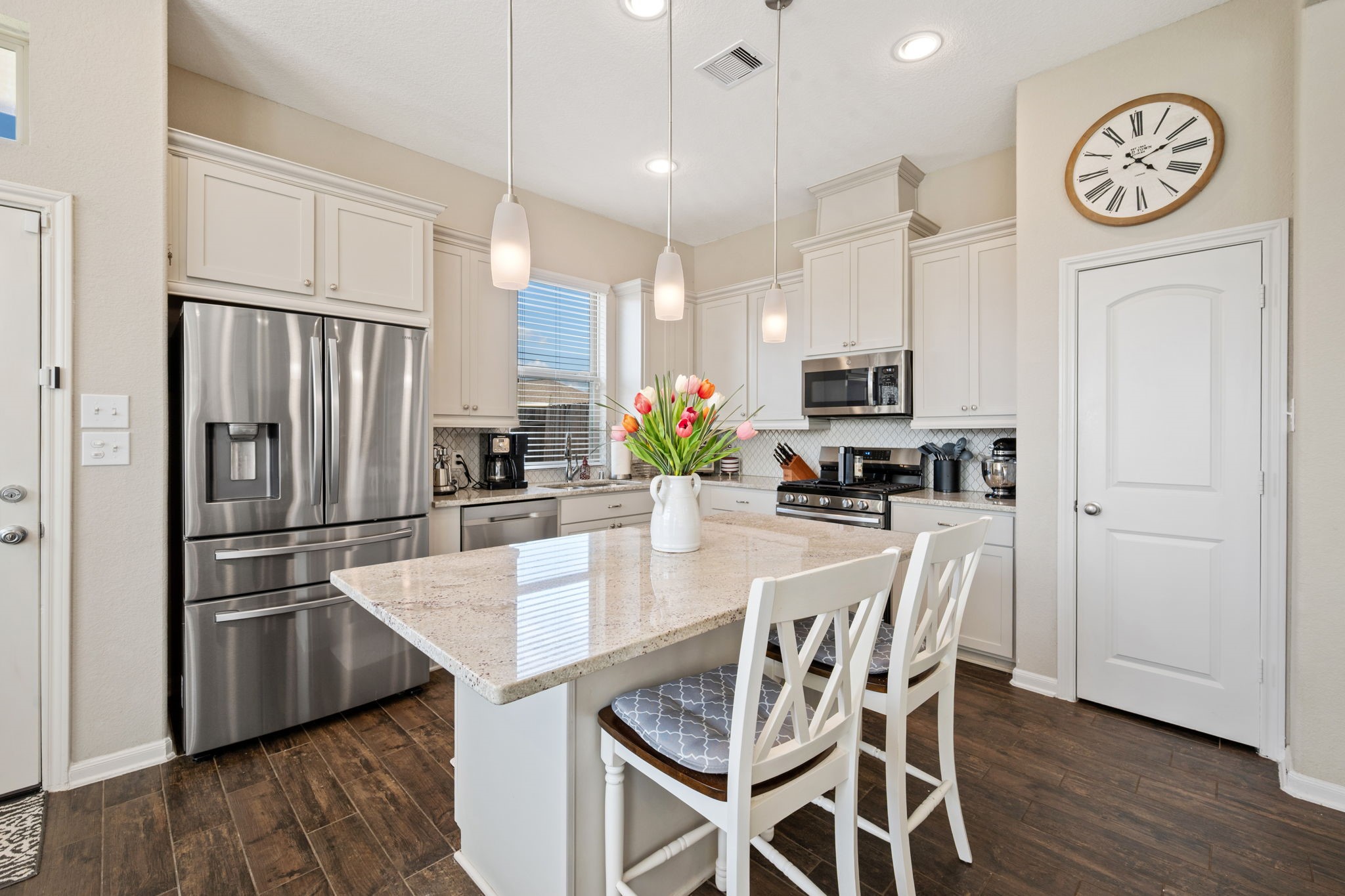 25330 Fallen Acorn Court Porter, TX 77365 - Photo 7 of 31 Modern Kitchen with new gas stove and microwave. Pantry and plenty of storage under island.