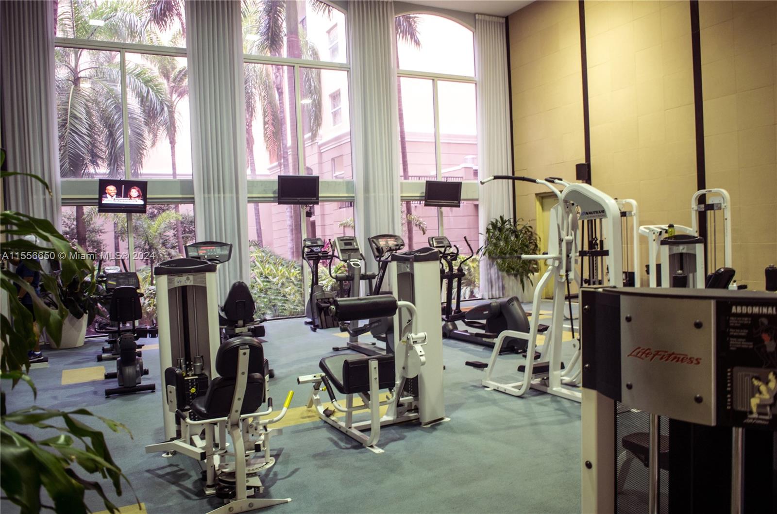 17100 North Bay Road, Unit 1402 Sunny Isles Beach, FL 33160 - Photo 23 of 25 a view of a room with gym equipment