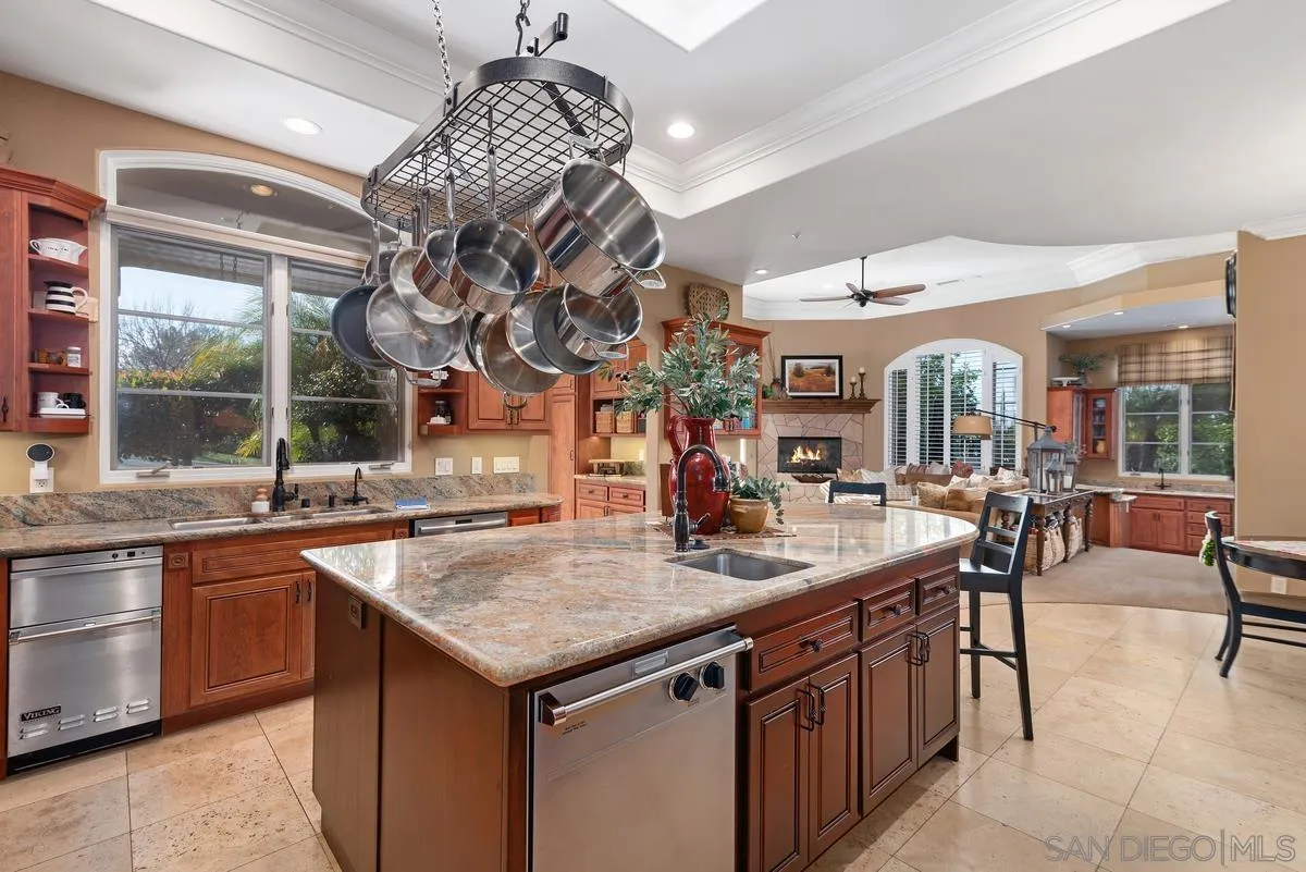 14360 Ciera Court Poway, CA 92064 - Photo 11 of 29 a open kitchen with a sink and chandelier