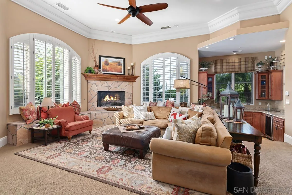 14360 Ciera Court Poway, CA 92064 - Photo 12 of 29 a living room with furniture fireplace and a large window