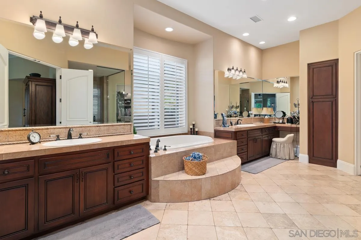 14360 Ciera Court Poway, CA 92064 - Photo 17 of 29 a large kitchen with kitchen island a sink stainless steel appliances and cabinets
