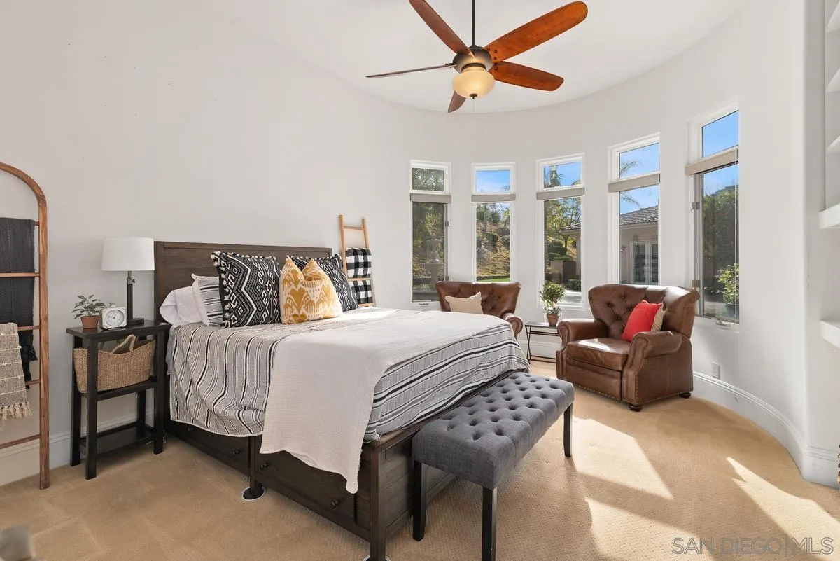 14360 Ciera Court Poway, CA 92064 - Photo 19 of 29 a bedroom with a bed and a couch