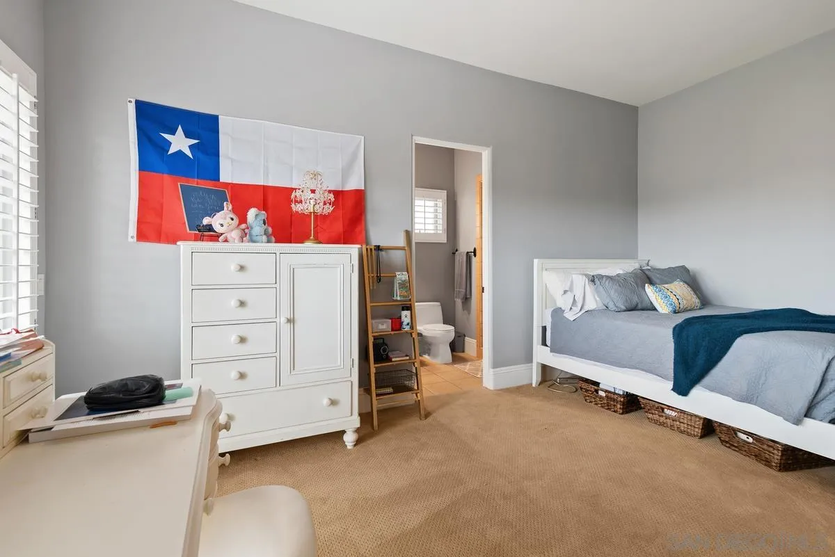 14360 Ciera Court Poway, CA 92064 - Photo 22 of 29 a bedroom with a bed and a couch