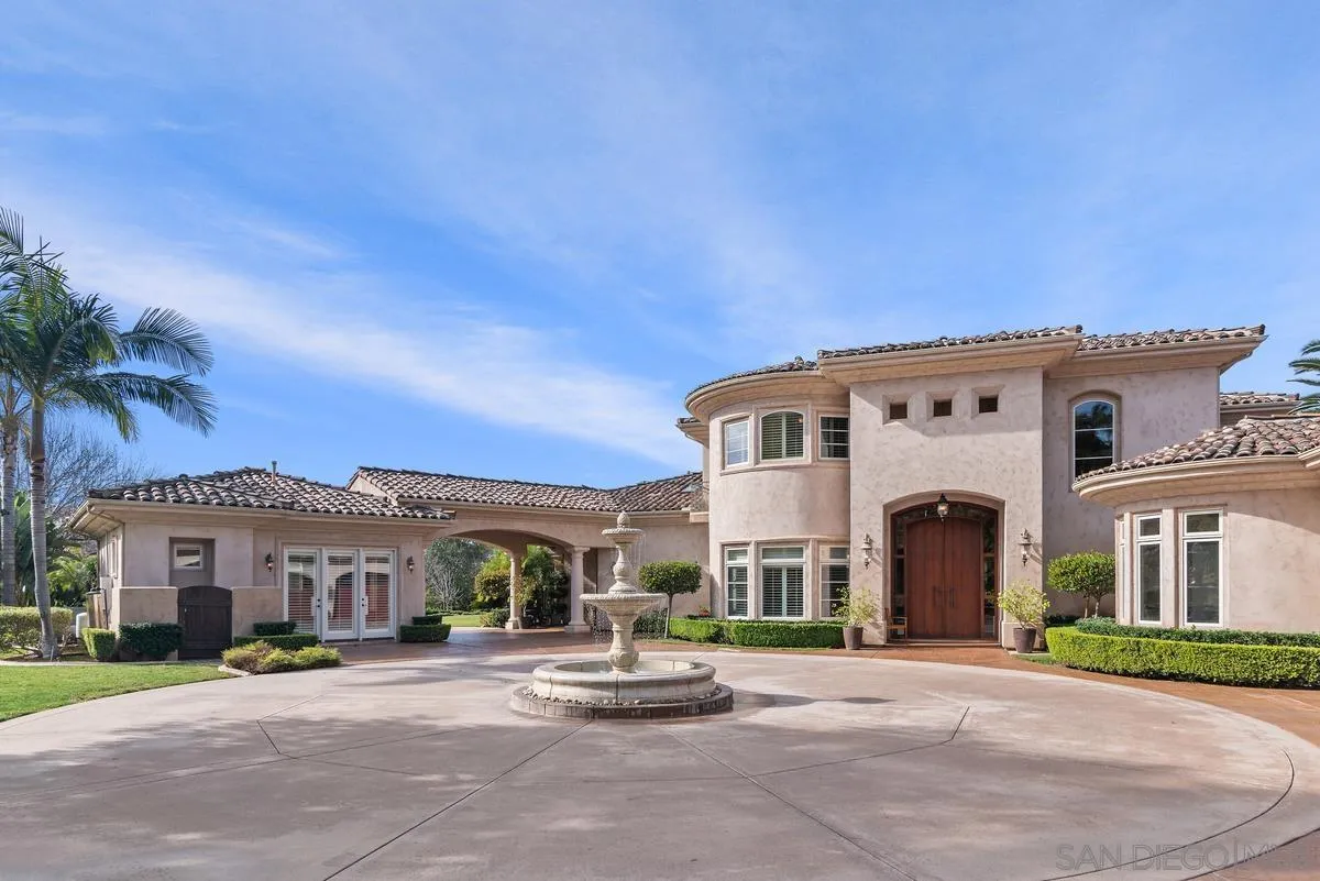 14360 Ciera Court Poway, CA 92064 - Photo 3 of 29 a front view of a building with a garden and parking