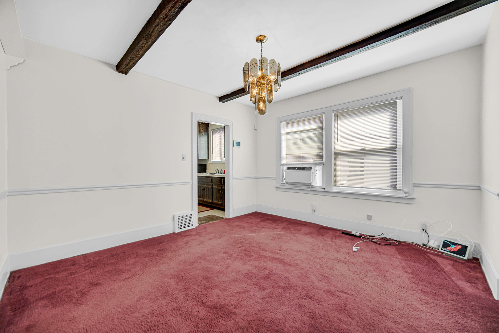 293 West 15th Street Chicago Heights, IL 60411 - Photo 5 of 16 an empty room with windows and ceiling fan