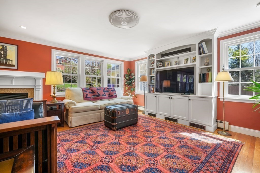 31 Malcolm Road Boston, MA 02130 - Photo 16 of 35 a living room with furniture and a flat screen tv
