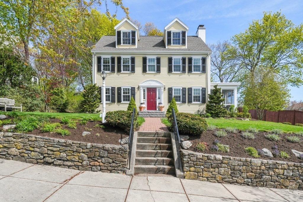 31 Malcolm Road Boston, MA 02130 - Photo 2 of 35 a front view of a house with a garden