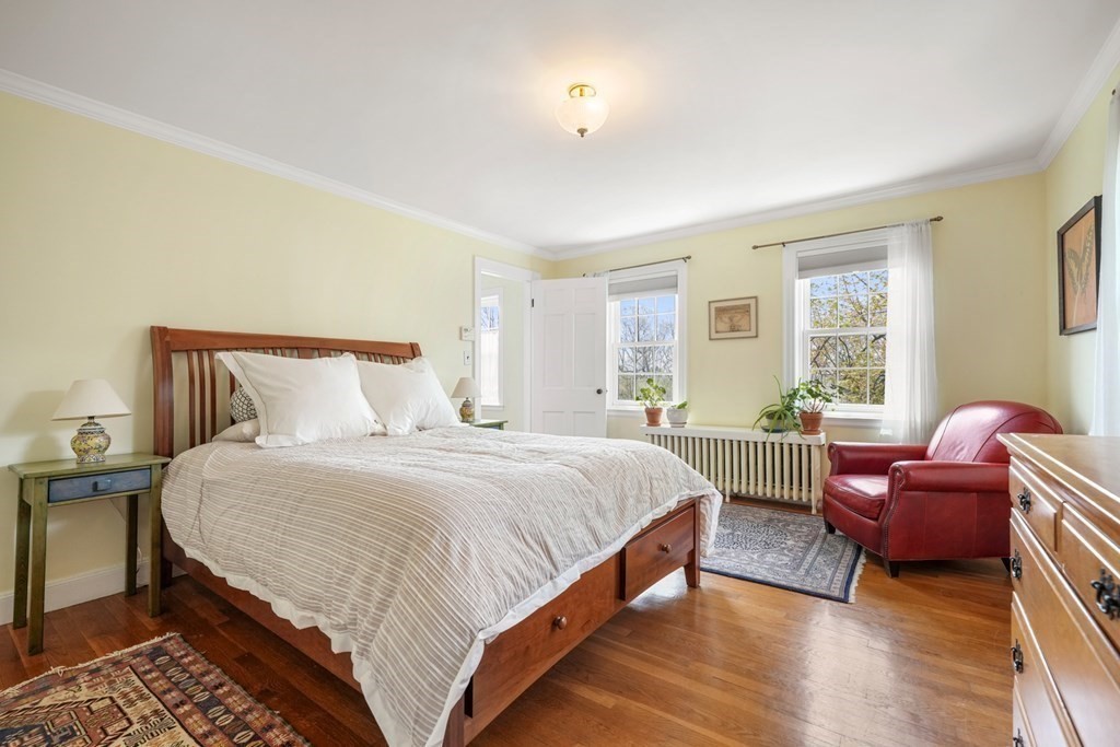 31 Malcolm Road Boston, MA 02130 - Photo 28 of 35 a bedroom with a bed chair and a window