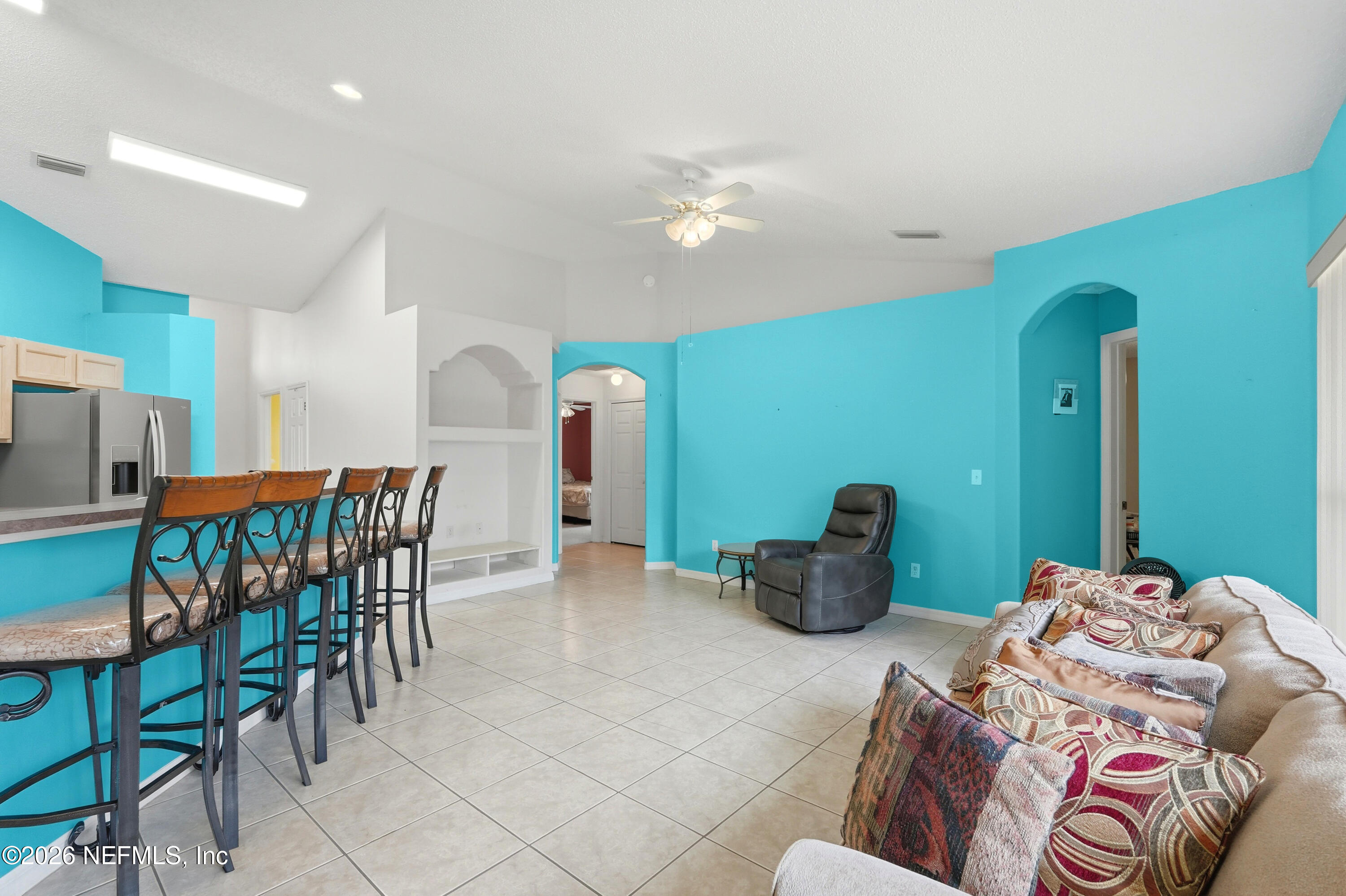 2270 Carson Lane Deltona, FL 32738 - Photo 12 of 24 a bedroom with furniture and a chandelier