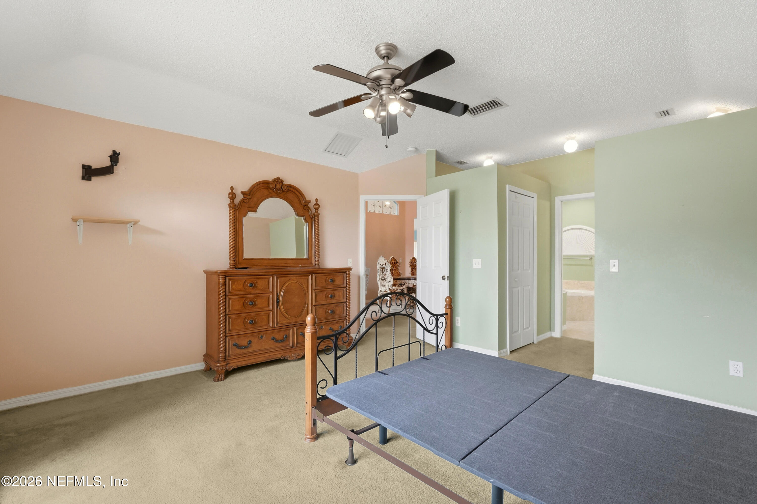 2270 Carson Lane Deltona, FL 32738 - Photo 14 of 24 a view of a livingroom with a ceiling fan and entryway