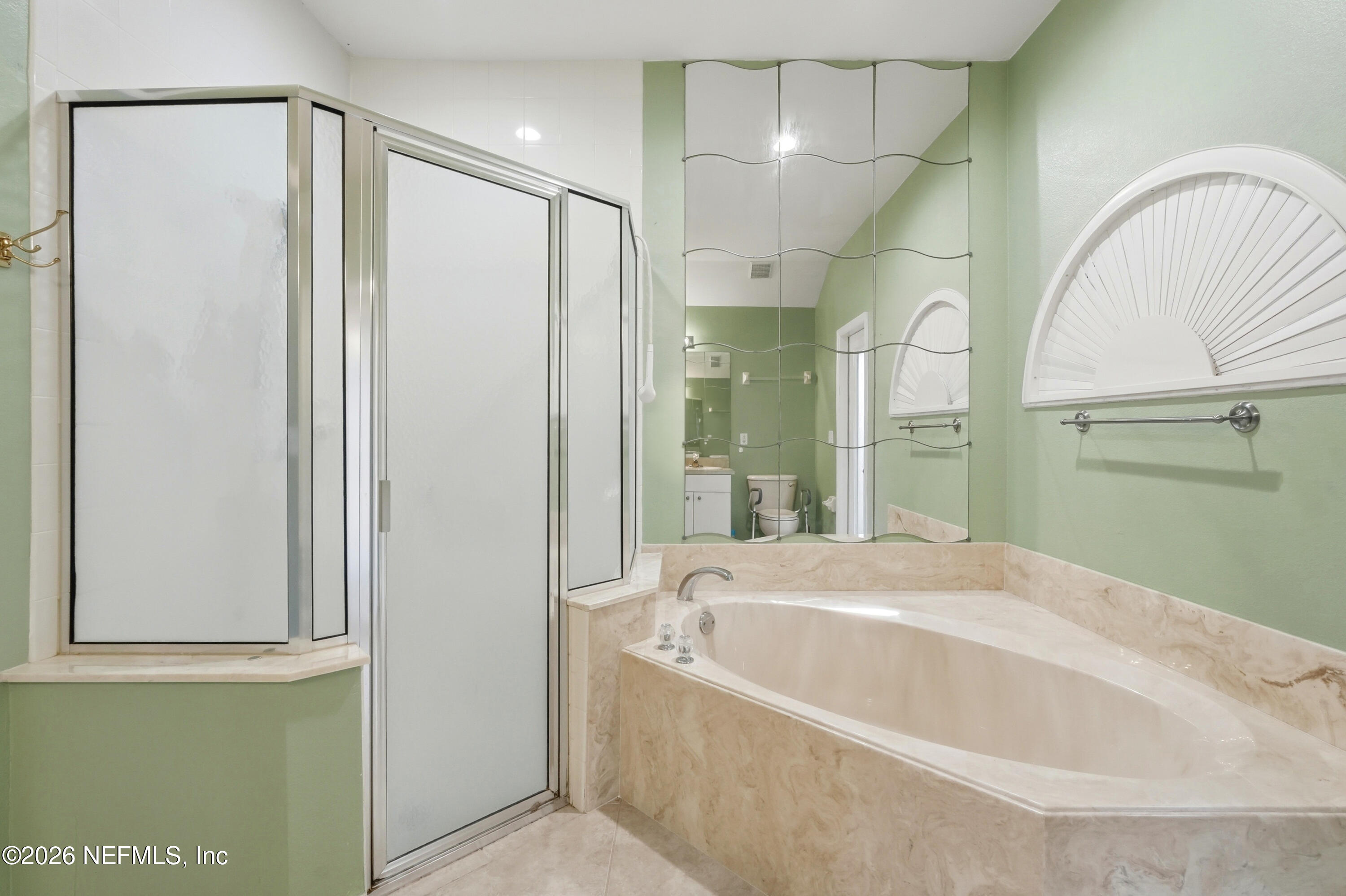 2270 Carson Lane Deltona, FL 32738 - Photo 16 of 24 a bathroom with a bathtub and a shower