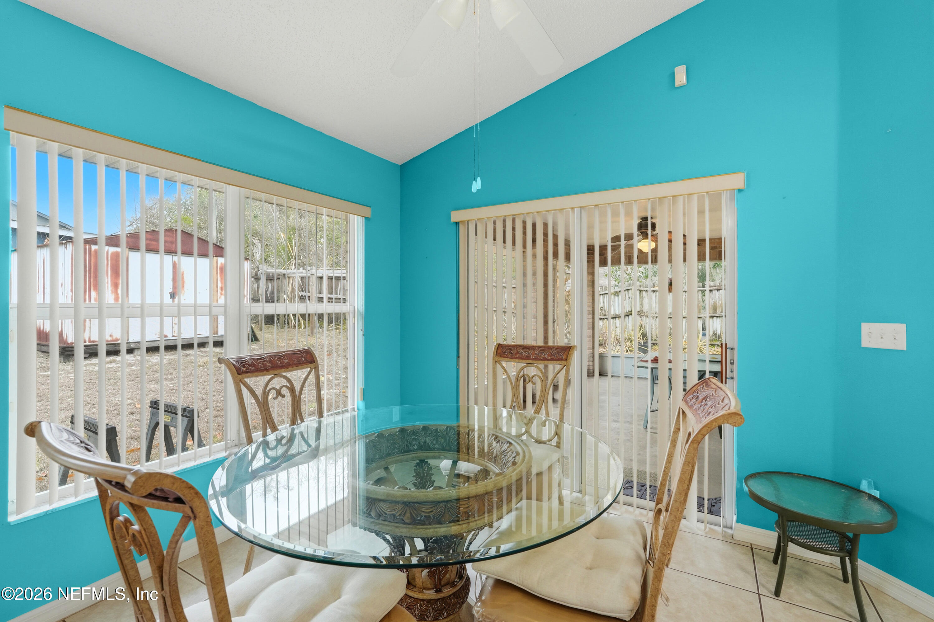 2270 Carson Lane Deltona, FL 32738 - Photo 5 of 24 a dining room with furniture and outdoor view