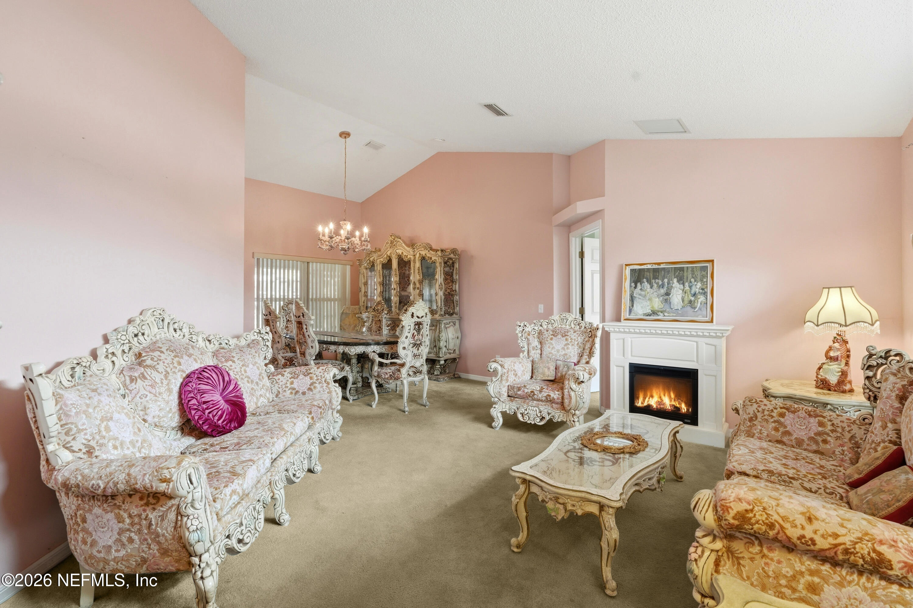2270 Carson Lane Deltona, FL 32738 - Photo 7 of 24 a living room with furniture fireplace and window
