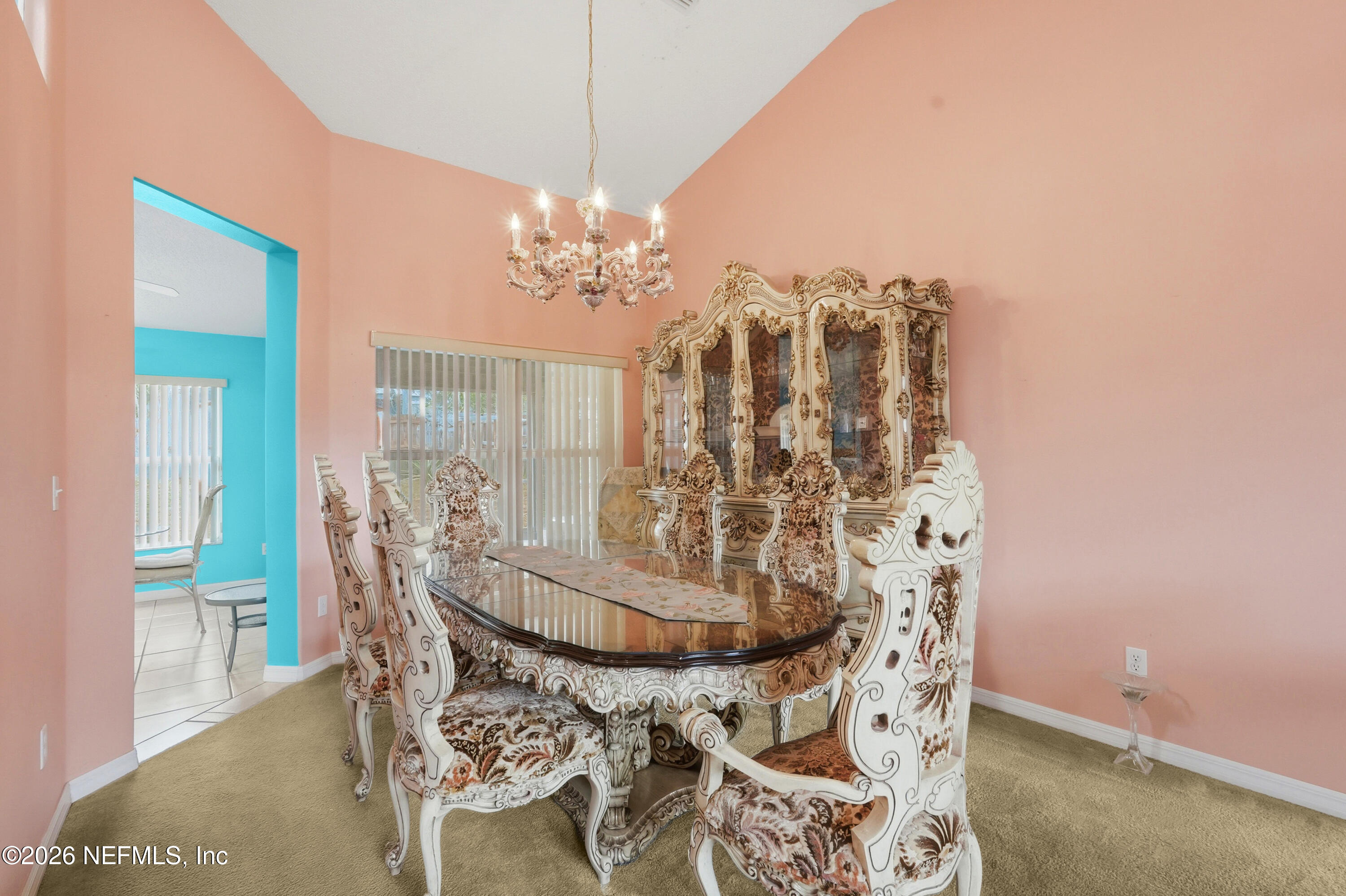 2270 Carson Lane Deltona, FL 32738 - Photo 8 of 24 a view of a dining room with furniture and chandelier