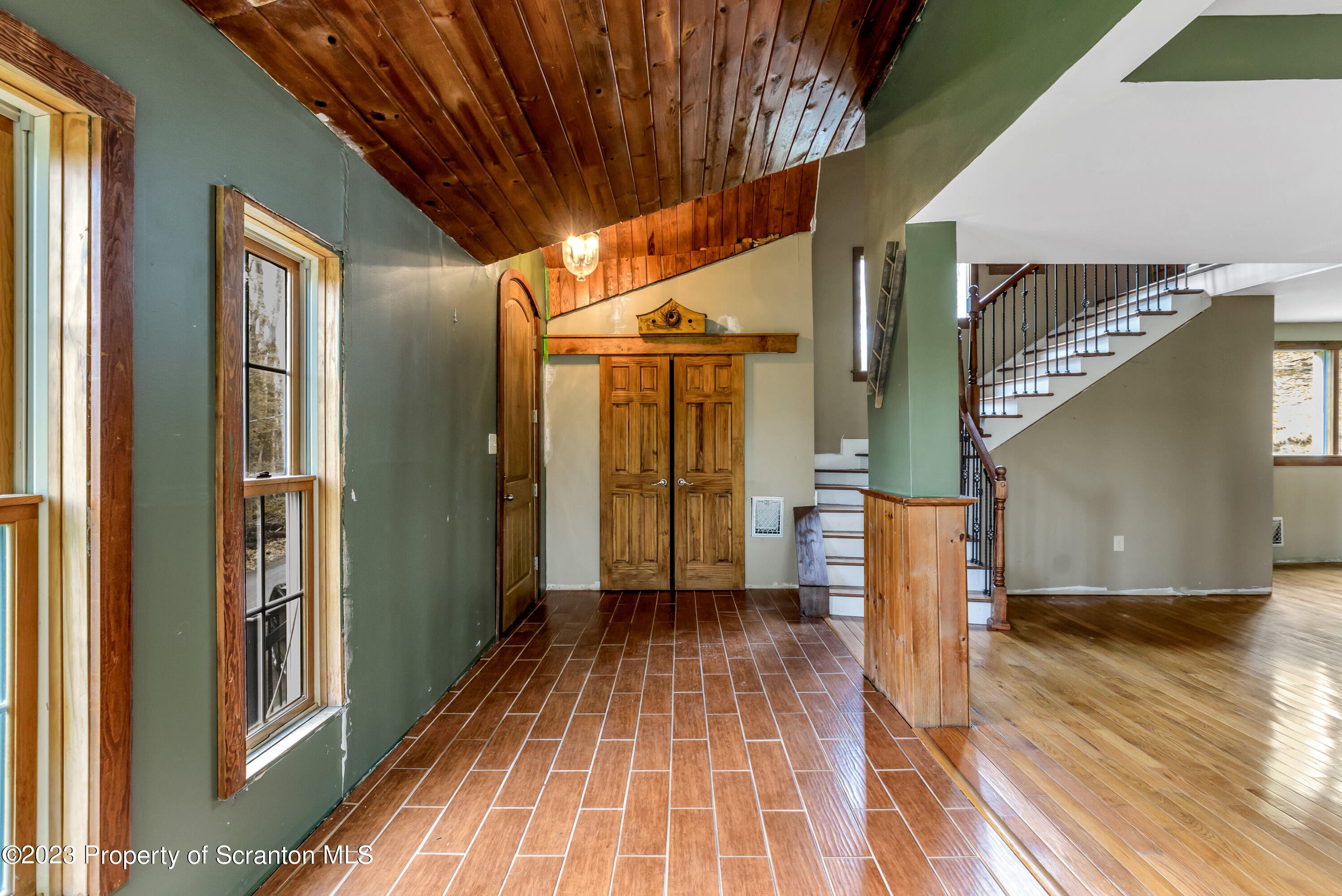 21 Ridge Street Dallas, PA 18612 - Photo 46 of 92 a view of a porch with wooden floor