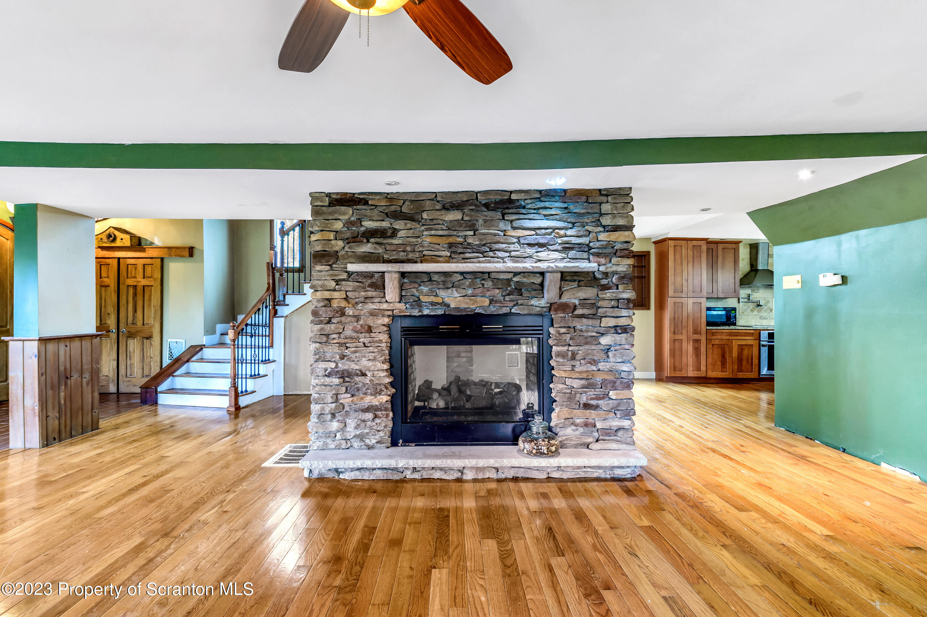 21 Ridge Street Dallas, PA 18612 - Photo 50 of 92 a living room with furniture and a fireplace