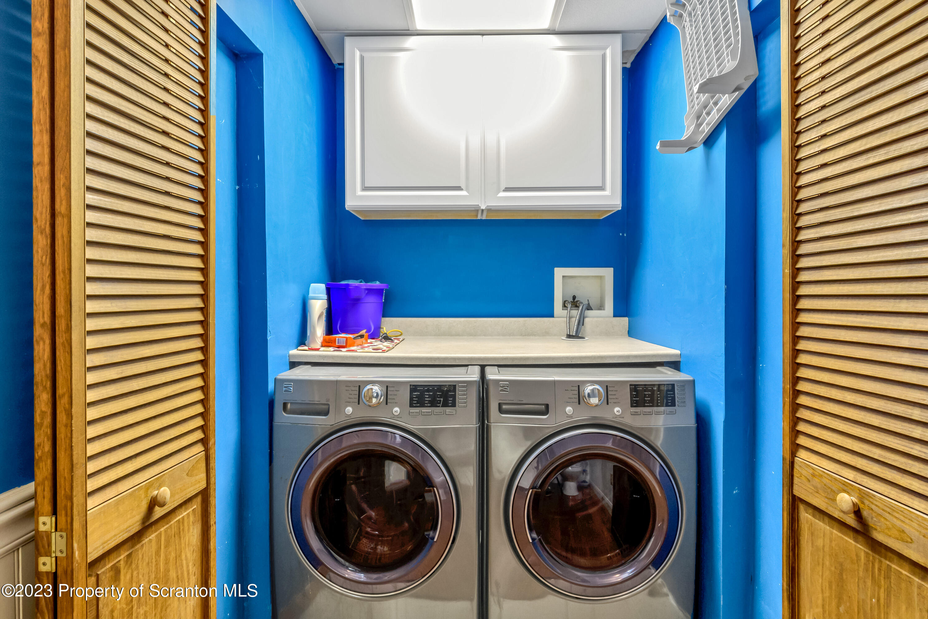 21 Ridge Street Dallas, PA 18612 - Photo 66 of 92 a utility room with dryer and washer