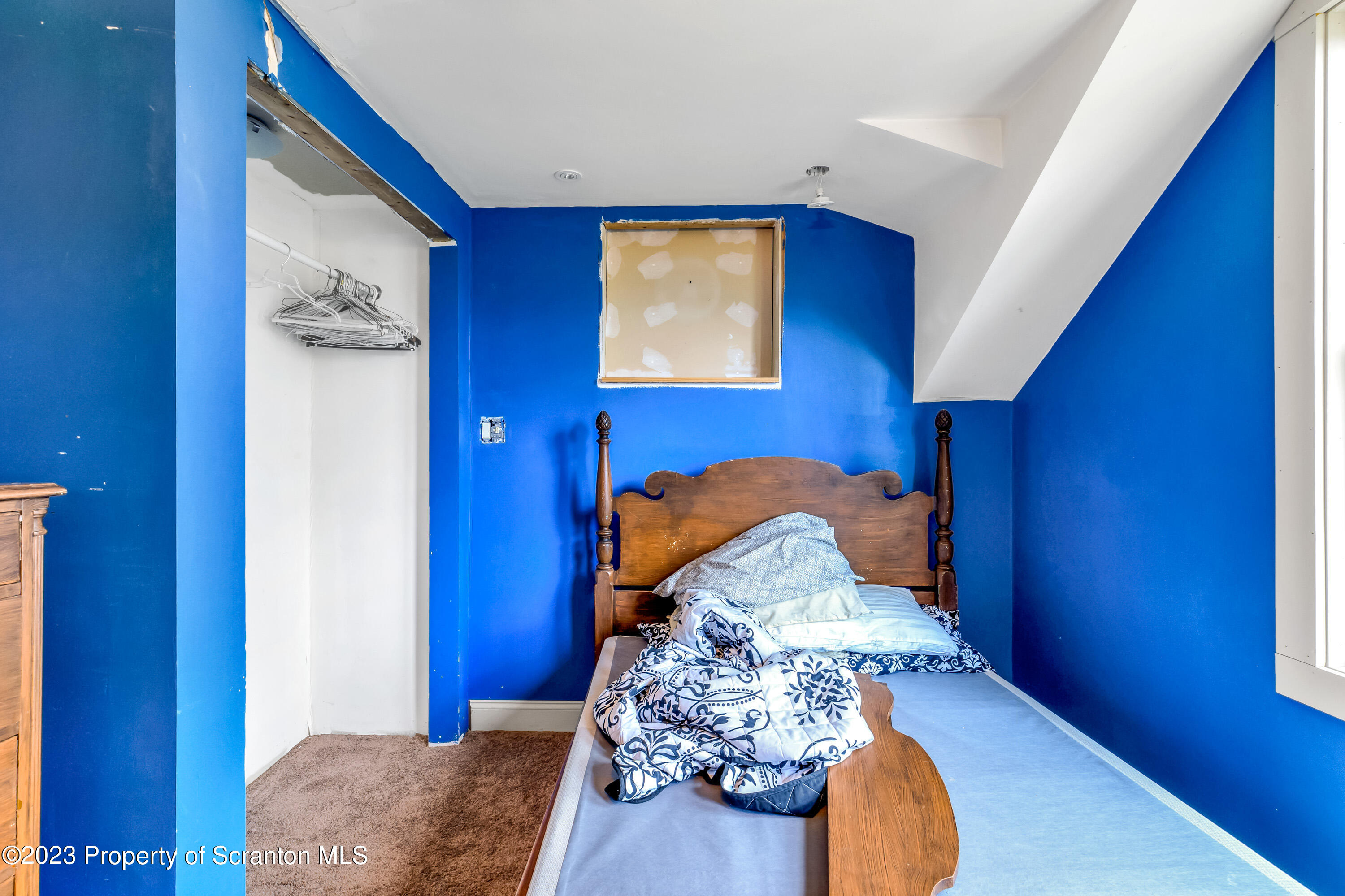 21 Ridge Street Dallas, PA 18612 - Photo 84 of 92 a room with furniture and wooden floor