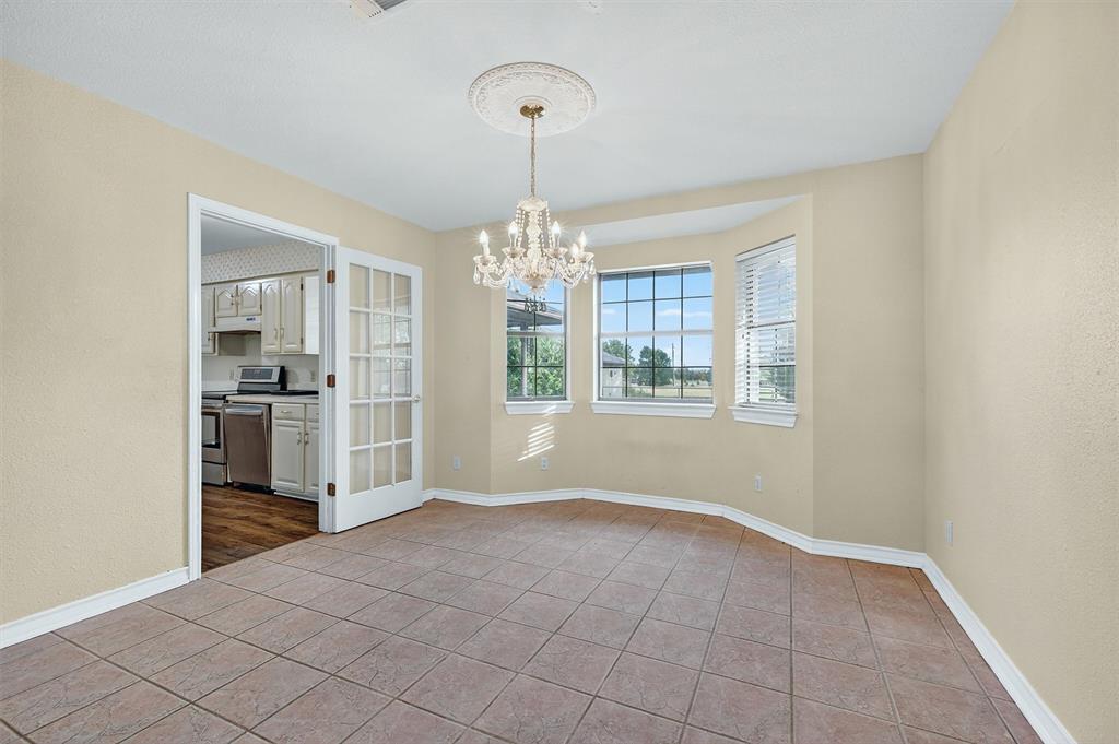 443 Lakewood Road Denison, TX 75020 - Photo 12 of 38 a view of livingroom with kitchen