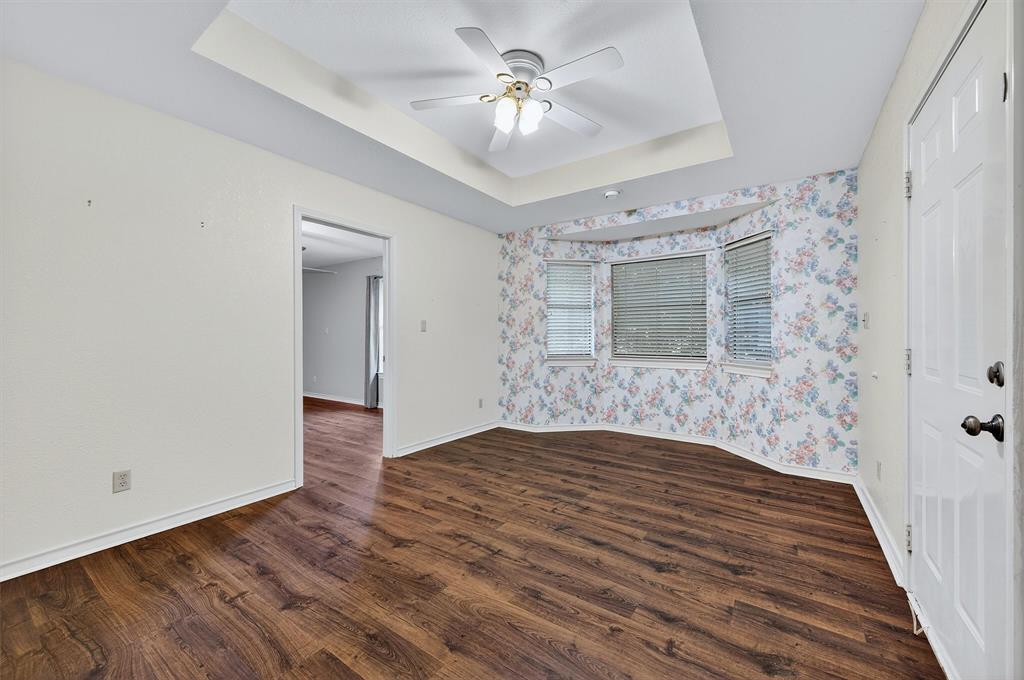 443 Lakewood Road Denison, TX 75020 - Photo 17 of 38 a view of an empty room with a window