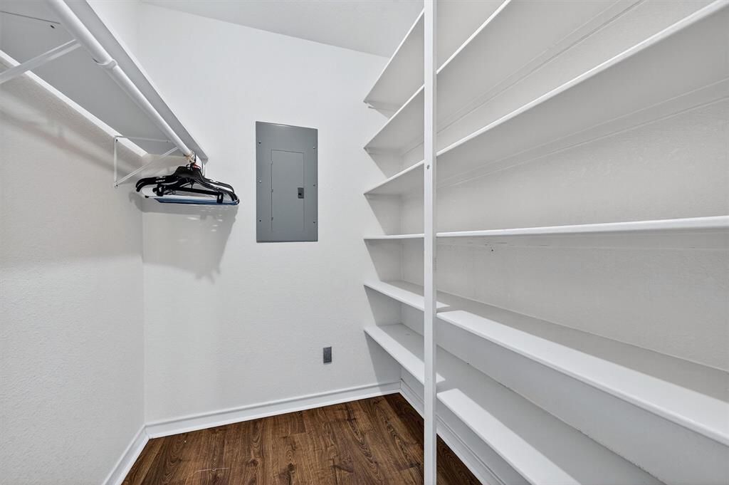 443 Lakewood Road Denison, TX 75020 - Photo 20 of 38 a view of walk in closet with empty racks