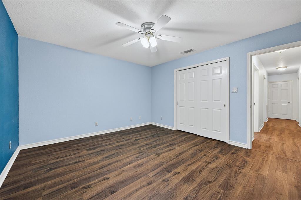 443 Lakewood Road Denison, TX 75020 - Photo 23 of 38 wooden floor in an empty room