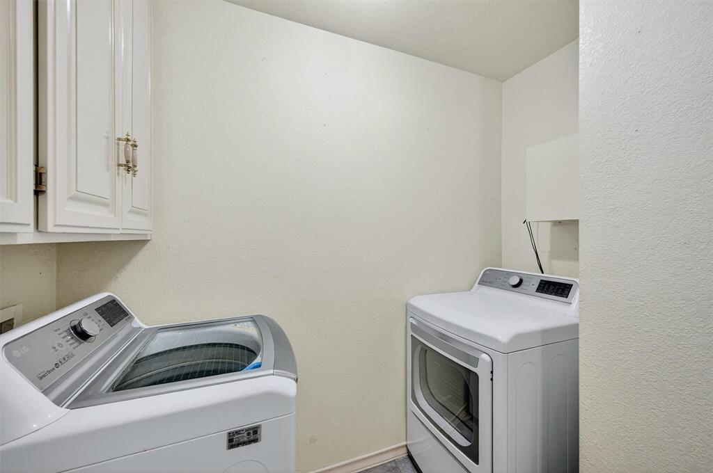 443 Lakewood Road Denison, TX 75020 - Photo 25 of 38 a utility room with dryer and washer