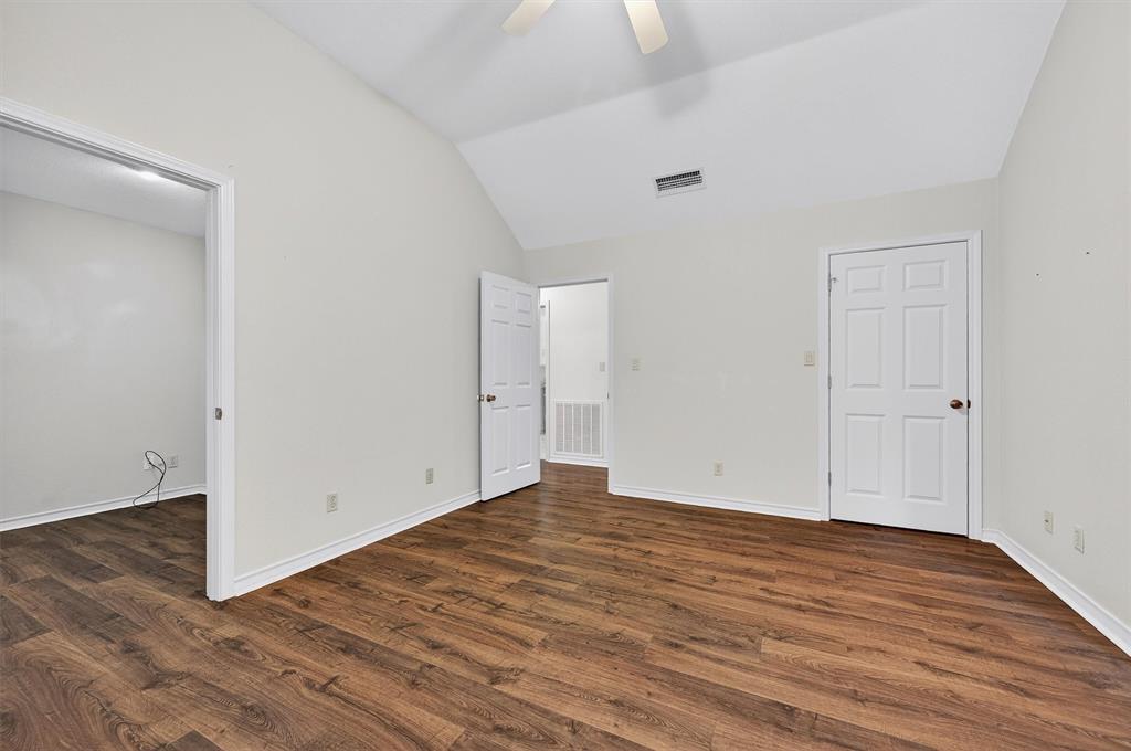 443 Lakewood Road Denison, TX 75020 - Photo 28 of 38 a view of empty room with wooden floor