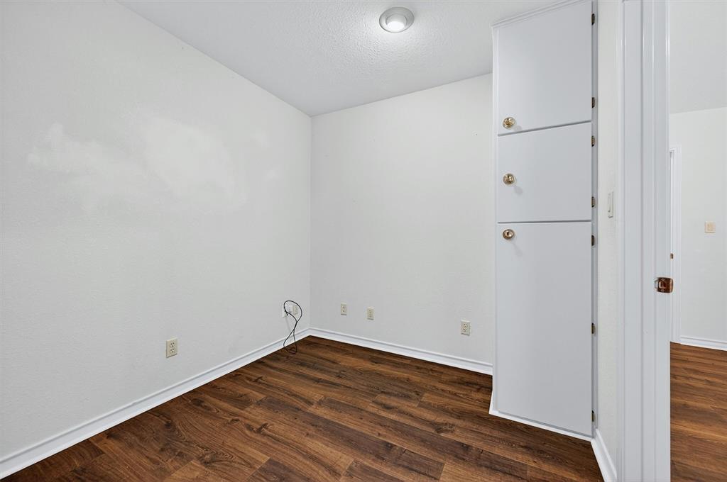 443 Lakewood Road Denison, TX 75020 - Photo 29 of 38 a view of empty room with wooden floor