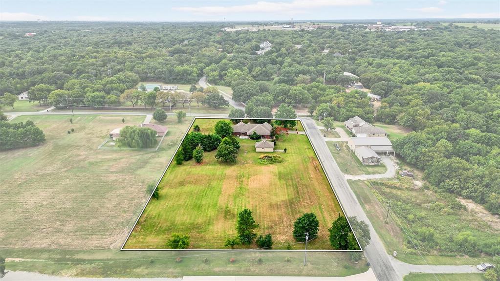 443 Lakewood Road Denison, TX 75020 - Photo 8 of 38 an aerial view of residential houses with outdoor space and swimming pool