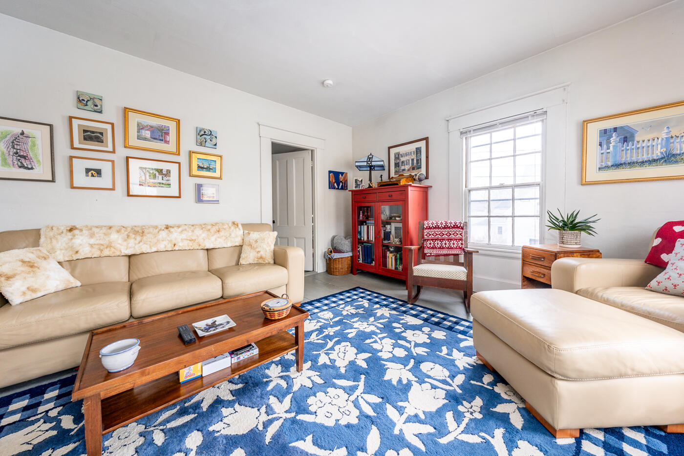 105 West Main Street Wellfleet, MA 02667 - Photo 23 of 59 a living room with furniture and a couch
