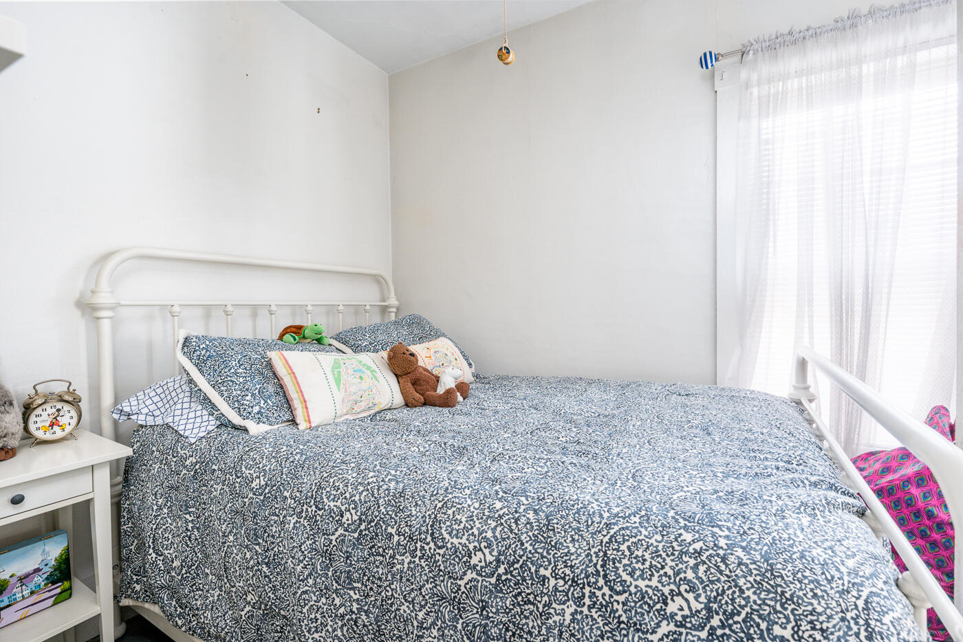 105 West Main Street Wellfleet, MA 02667 - Photo 26 of 59 a bedroom with a bed and a window